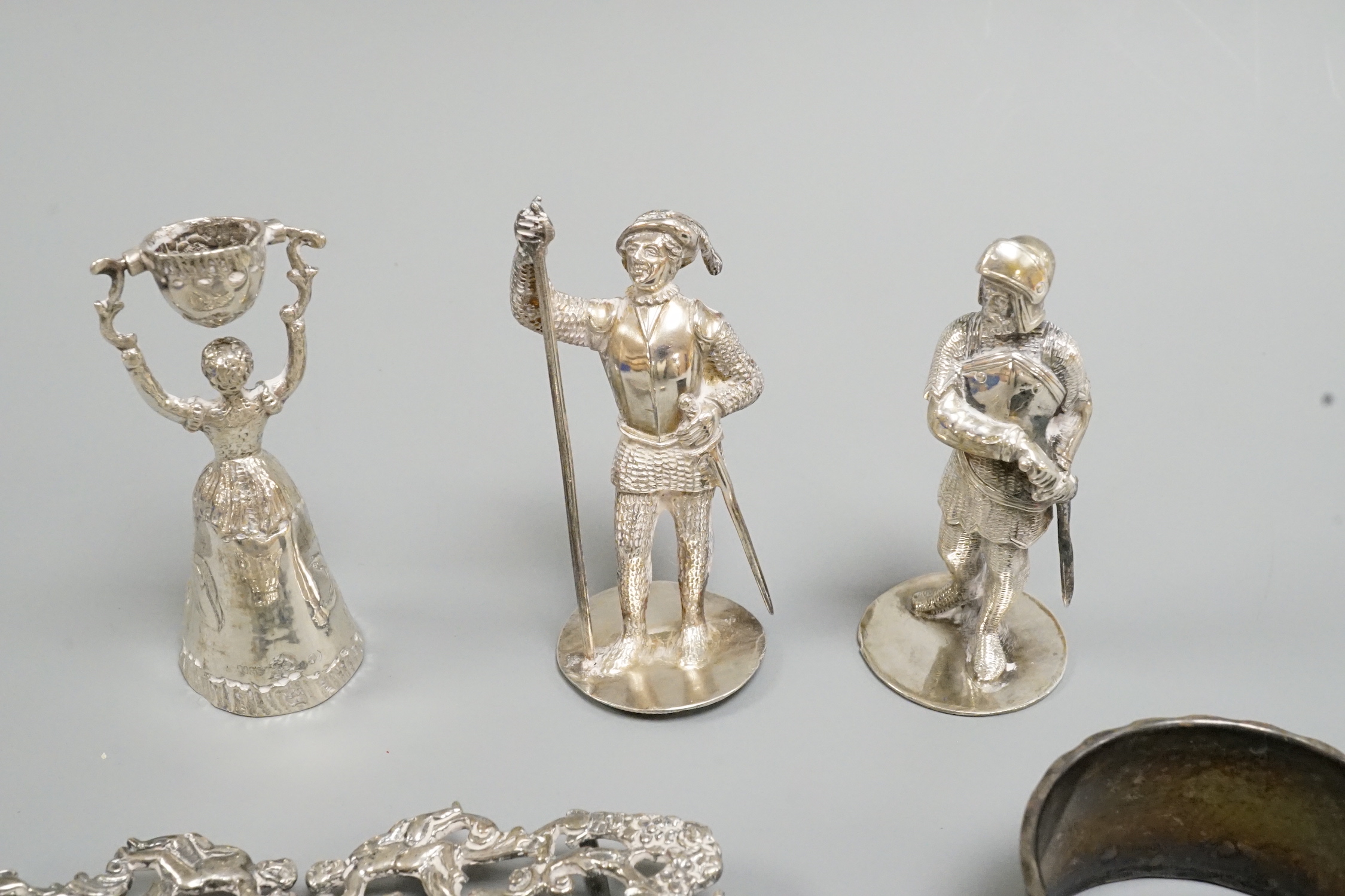 A continental 800 standard white metal miniature wager cup, 64mm, a modern silver belt buckle, silver vesta case and three other items.